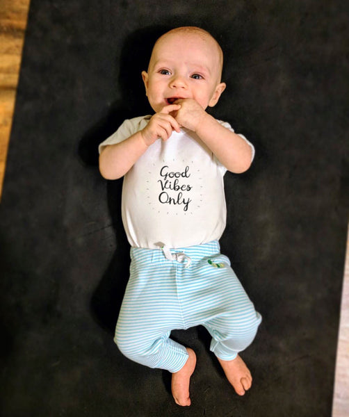 Yoga baby, organic cotton girl boy, good vibes only onesies for babies. Certified organic cotton baby onesie. Baby yoga bodysuit ethically made soft cotton. No latex, skin-friendly. Toddler skin healthy. non-toxic, eco-friendly yoga onesies for babies made with minimal wastage. Good vibe romper, babies enjoy yoga. Comfy. Made to last. Gift for babies. Unisex gender-neutral bodysuit, baby shower gift. Unisex onesie 3, 6, 12 months yoga onesies. White bodies baby clothes. one piece