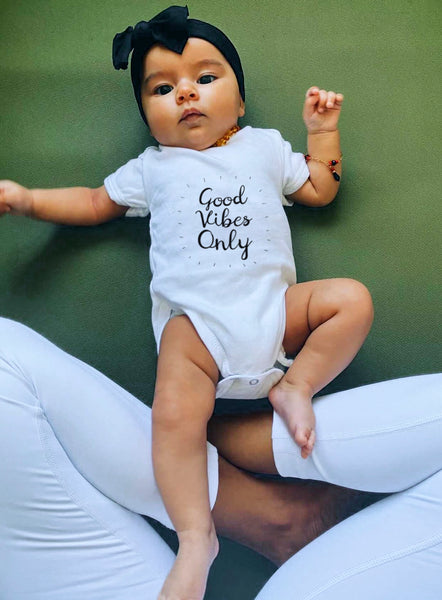 Yoga baby, organic cotton girl boy, good vibes only onesies for babies. Certified organic cotton baby onesie. Baby yoga bodysuit ethically made soft cotton. No latex, skin-friendly. Toddler skin healthy. non-toxic, eco-friendly yoga onesies for babies made with minimal wastage. Good vibe romper, babies enjoy yoga. Comfy. Made to last. Gift for babies. Unisex gender-neutral bodysuit, baby shower gift. Unisex onesie 3, 6, 12 months yoga onesies. White bodies baby clothes. one piece
