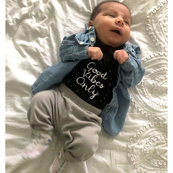 Yoga baby, organic cotton girl boy, good vibes only onesies for babies. Certified organic cotton baby onesie. Baby yoga bodysuit ethically made soft cotton. No latex, skin-friendly. Toddler skin healthy. non-toxic, eco-friendly yoga onesies for babies made with minimal wastage. Good vibe romper, babies enjoy yoga. Comfy. Made to last. Little yogi gift for babies. Unisex gender-neutral bodysuit, baby shower gift. Unisex onesie 3, 6, 12 months yoga onesies. Black. White yoga bodies baby clothes. one piece